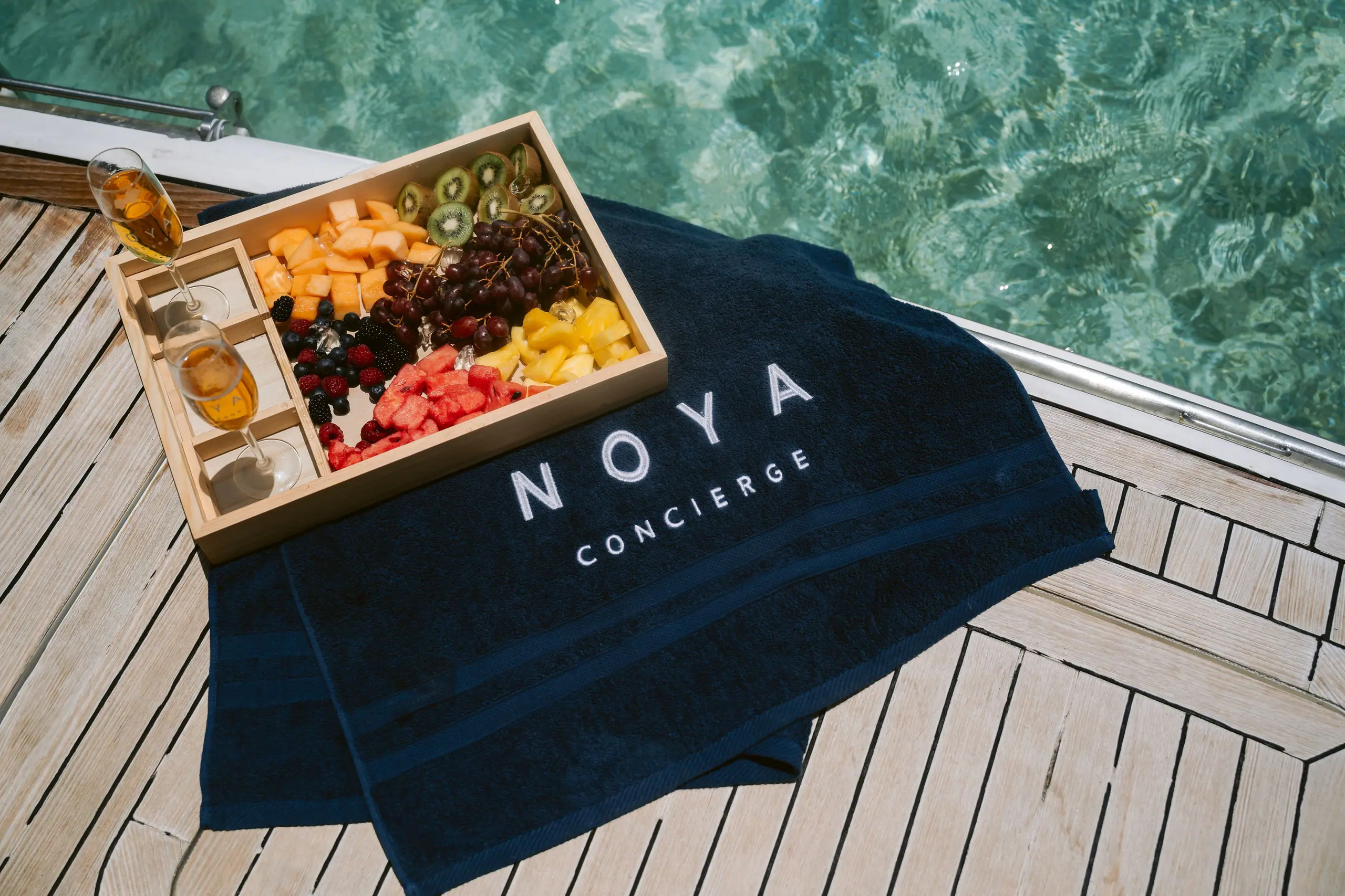 A NOYA picnic board on the deck of a boat